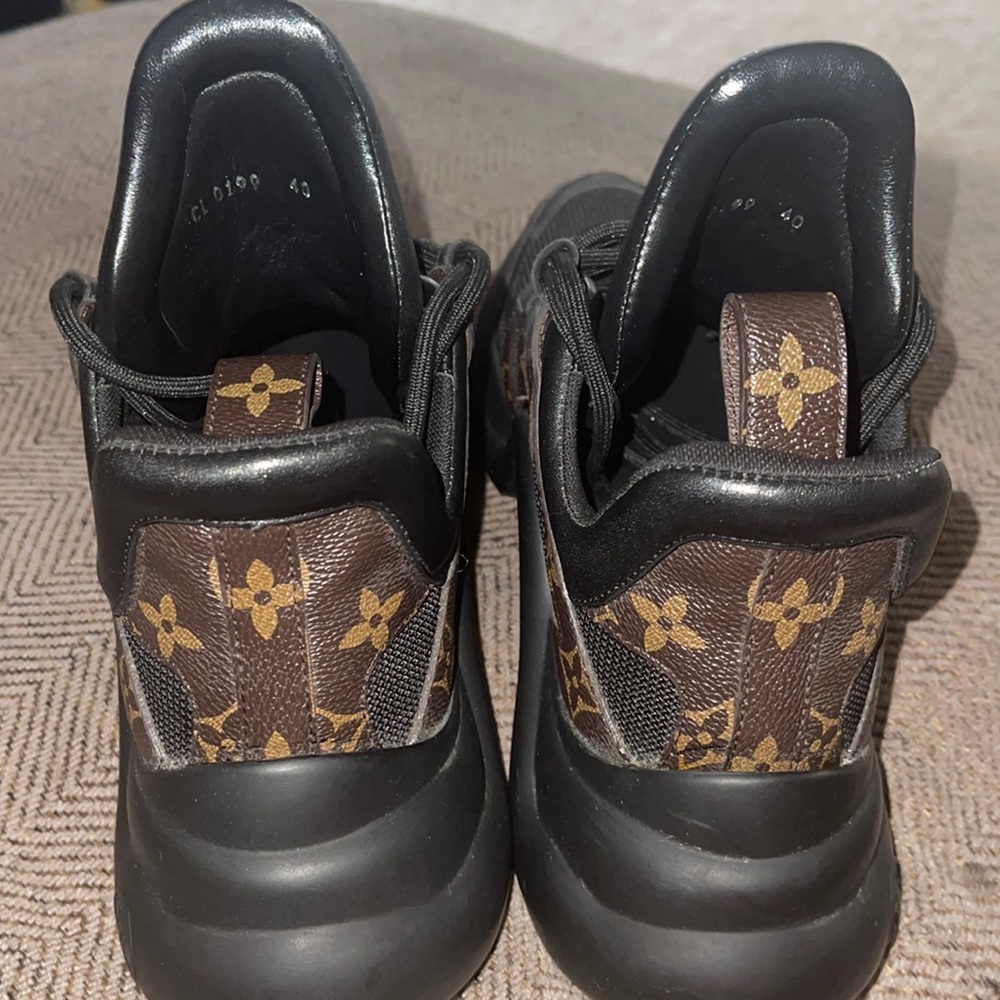 Louis Vuitton shoes. Only worn once they were to small.